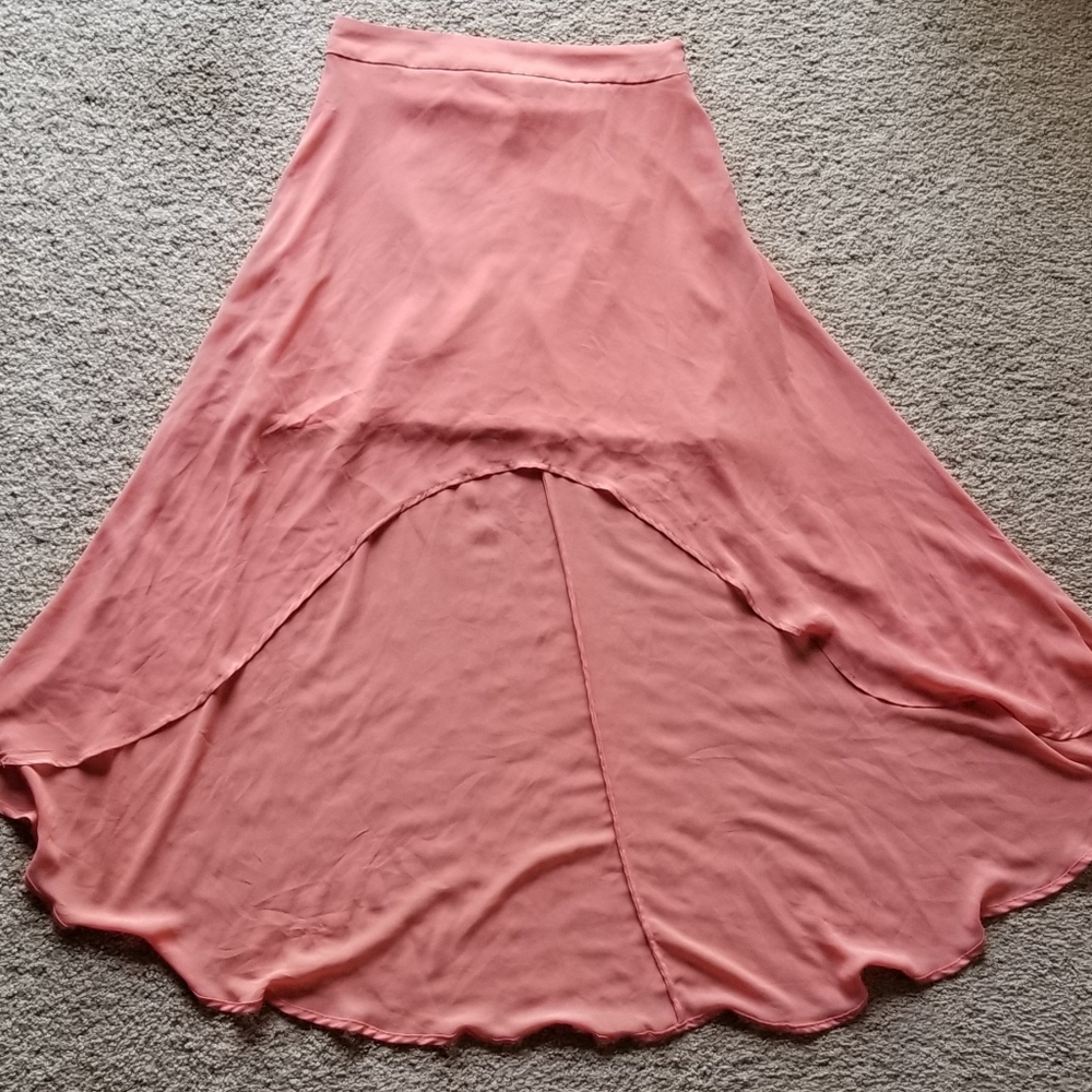 High-low skirt.
